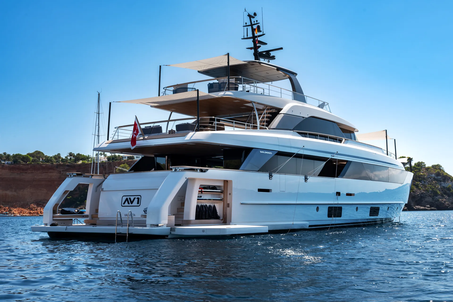 The stern of AV1 with her name, the swim platform down and the garage open
